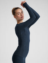 blue long sleeve crew neck top with thumb holes.